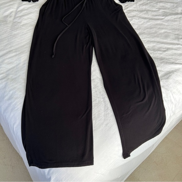 Chic Black Jumpsuit with Blouson Top Long Sleeves and Wide-Leg Pants size XL - Picture 7 of 15
